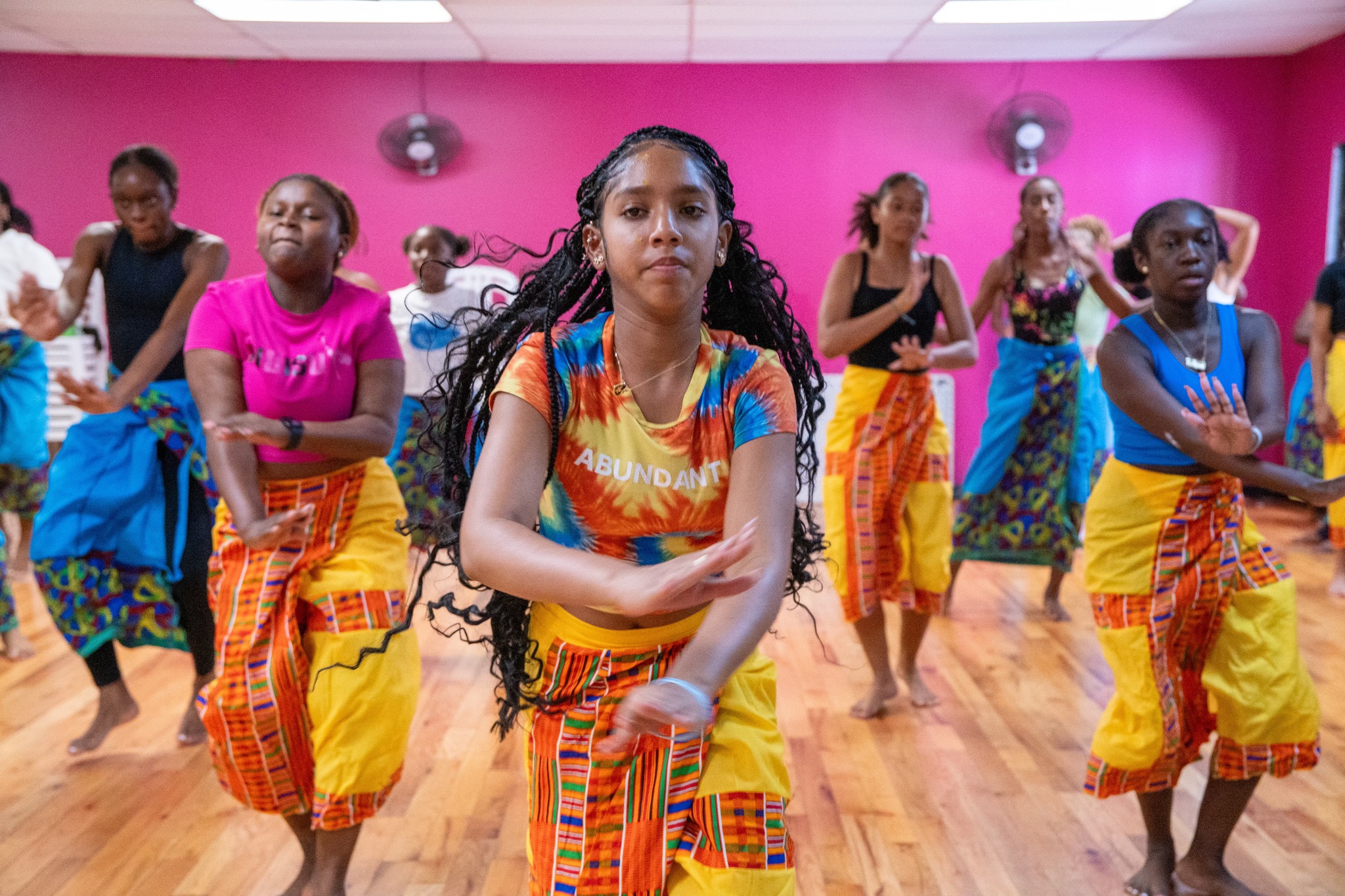 Students performing African and Caribbean dance