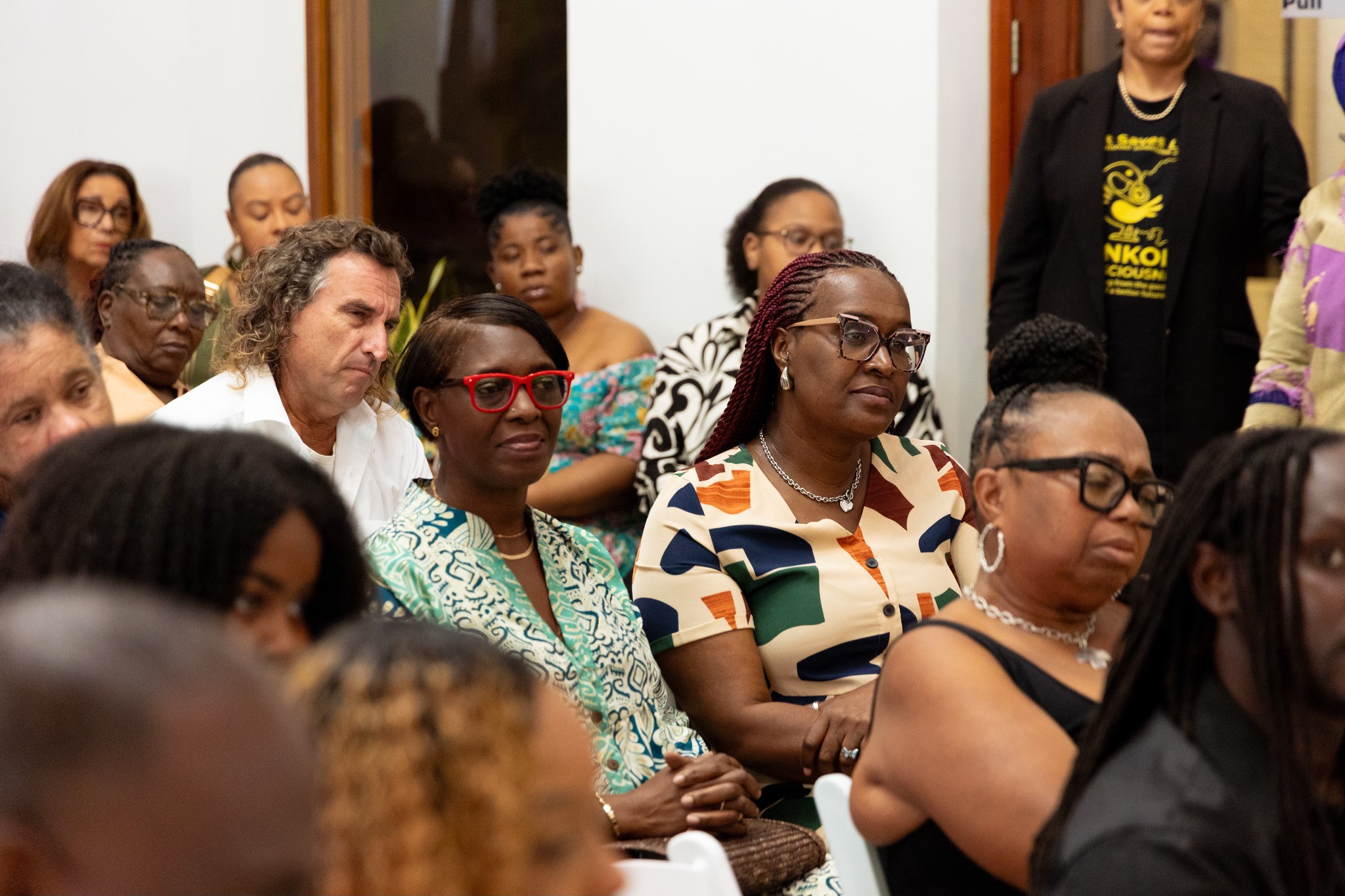 Community members with Shaka Senghor at the Tourism Bureau