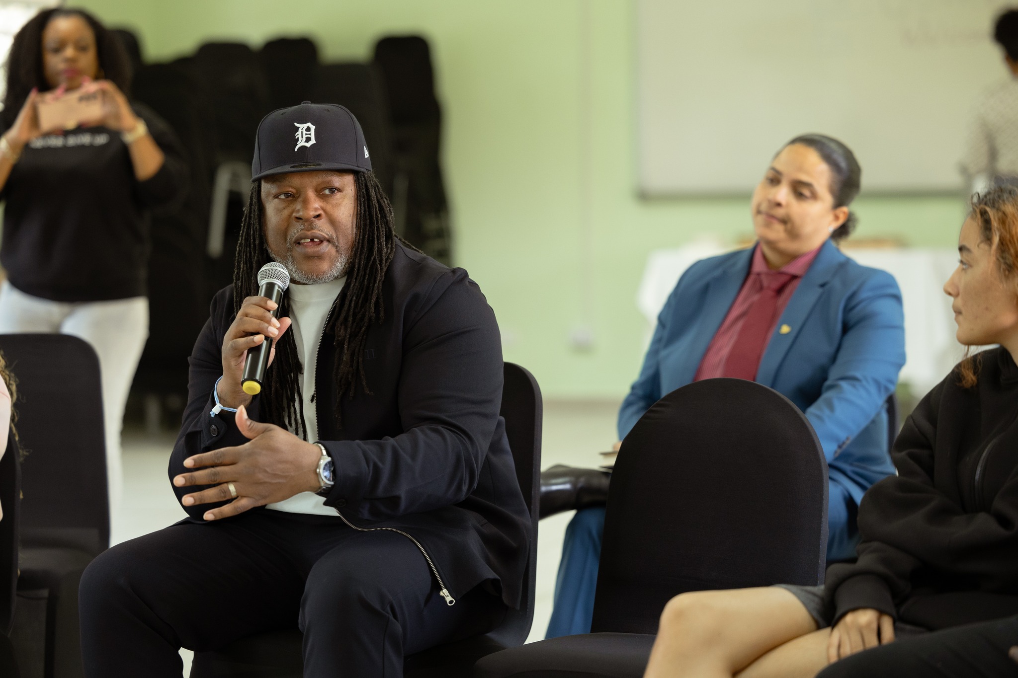 Shaka Senghor speaking with students at the University of St. Martin
