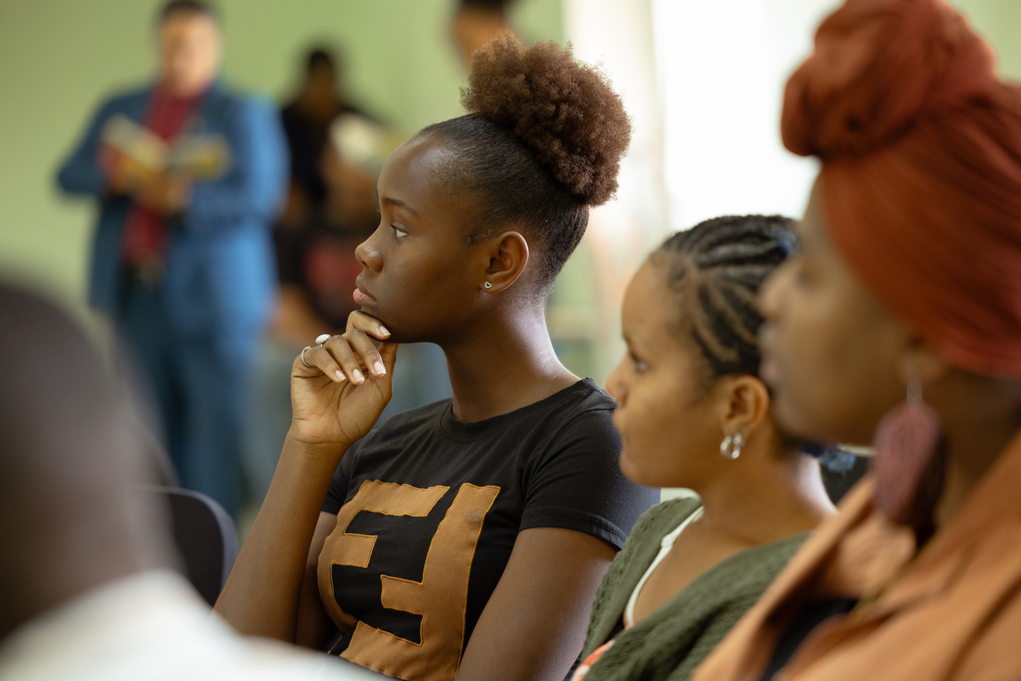 Shaka Senghor with students at the University of St. Martin