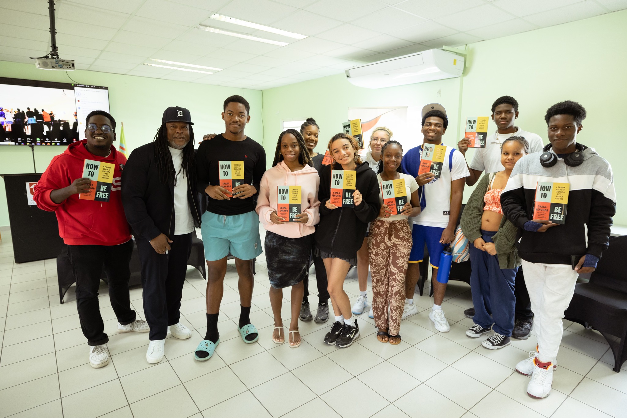 Students engaging with Shaka Senghor at the university