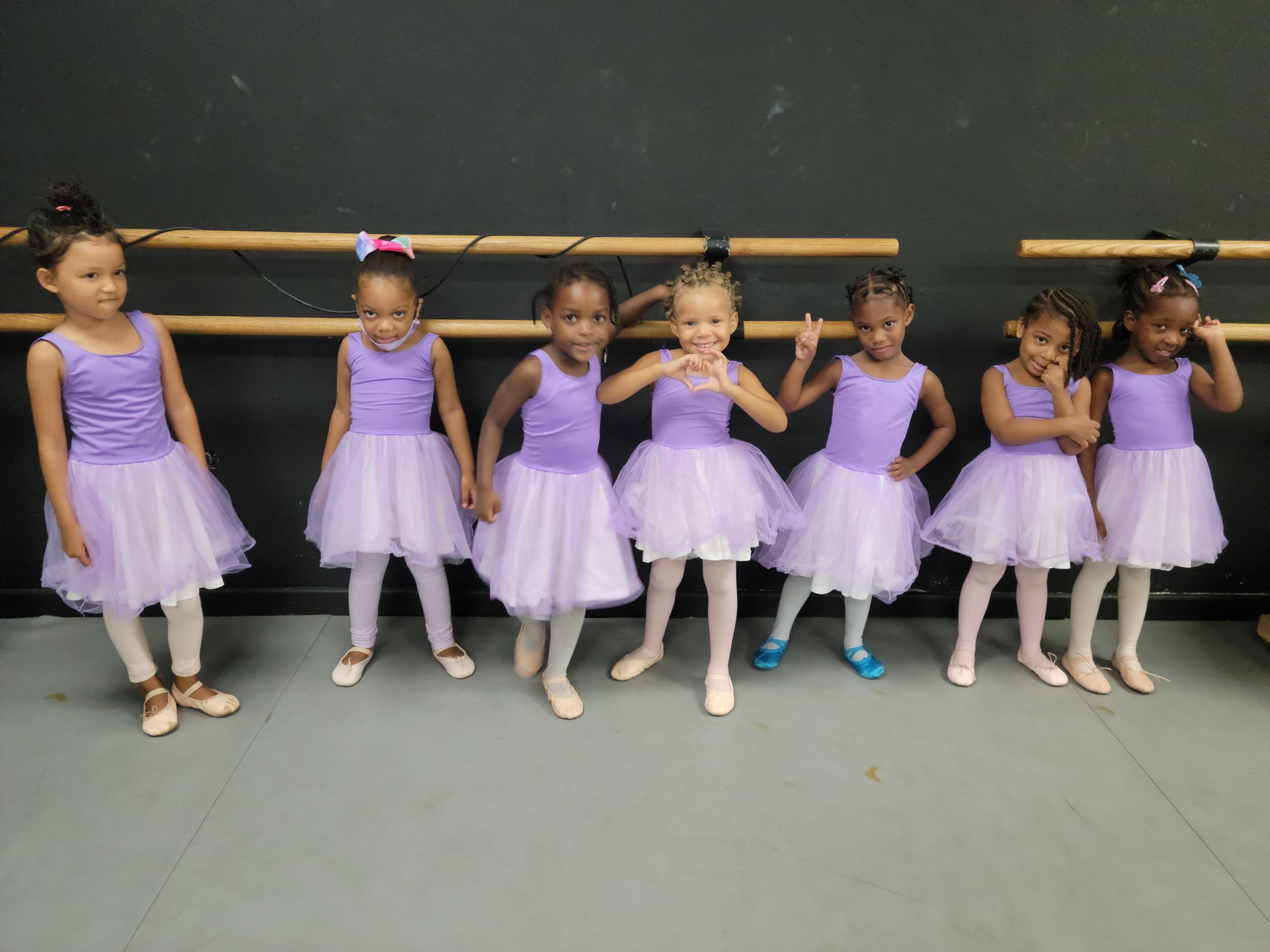 Princess Program dancers in their lilac dresses at the National Institute of Arts
